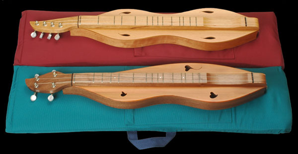 Click here for a larger view of Ron Ewing's dulcimettes with cases